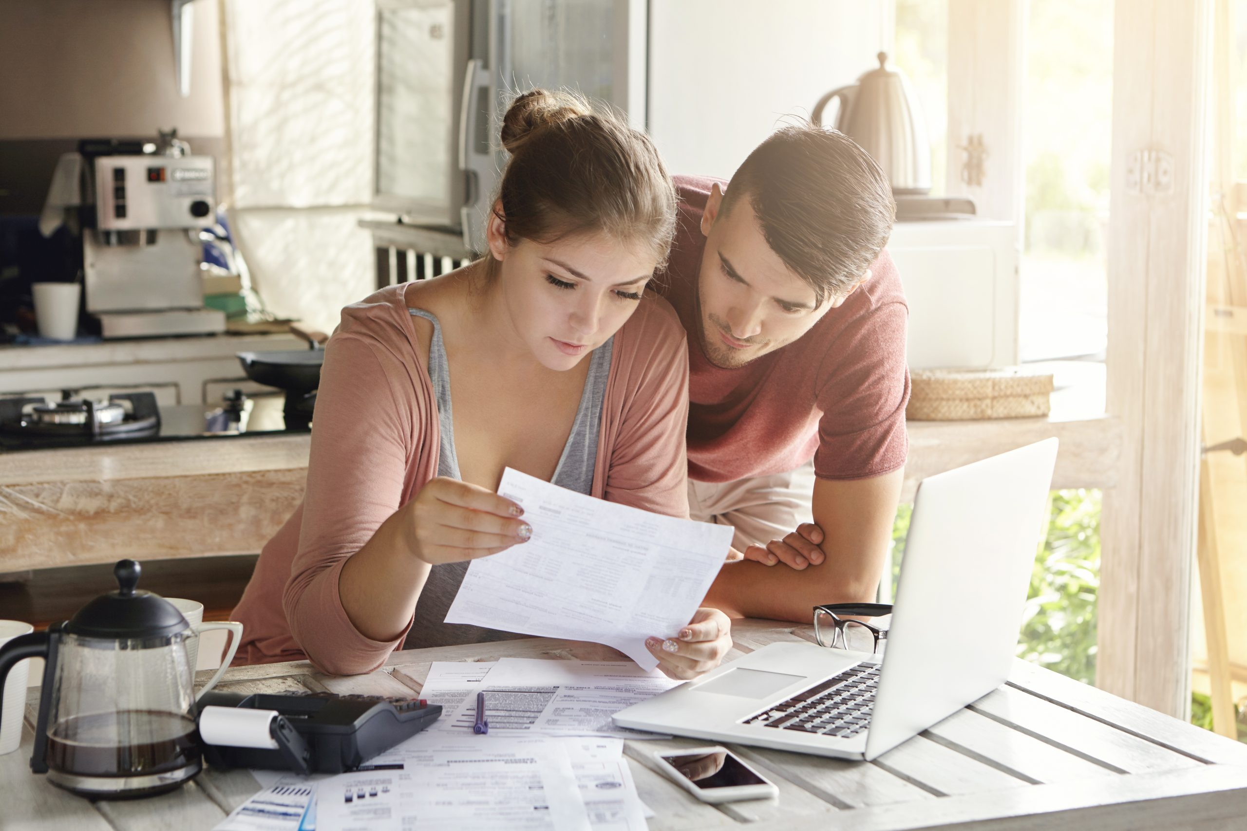 Young couple looking at papers